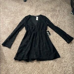 Black bell sleeved lace dress